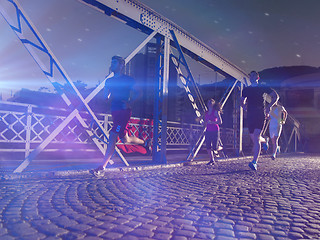 Image showing young people jogging across the bridge