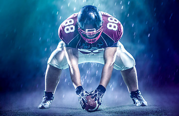 Image showing American football player starting football game