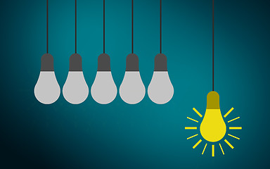 Image showing One light bulb standing out from other bulbs