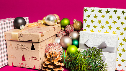 Image showing Christmas decoration gift box with pink background