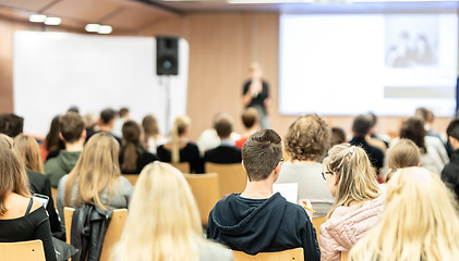 Image showing Female speaker giving presentation on business conference.