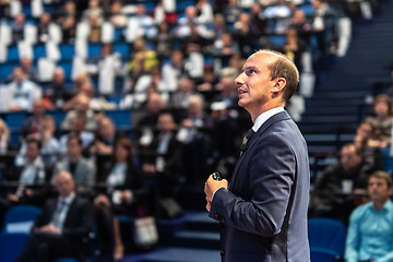 Image showing Public speaker giving talk at Business Event.