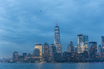 Image showing Panoramic view of Lower Manhattan from Ellis Island at dusk, New York City.