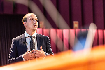 Image showing Public speaker giving talk at Business Event.