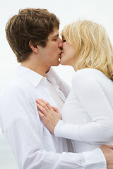 Image showing Caucasian couple kissing