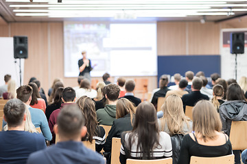 Image showing Female speaker giving presentation on business conference.