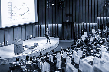 Image showing Speaker giving presentation on business conference event.