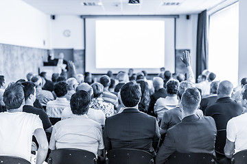 Image showing Business speaker giving a talk at business conference event.