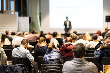 Image showing Business speaker giving a talk at business conference event.