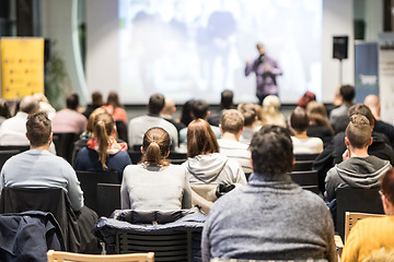 Image showing Business speaker giving a talk at business conference event.