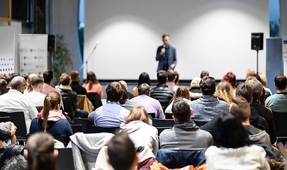 Image showing Business speaker giving a talk at business conference event.