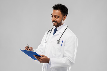 Image showing indian male doctor with clipboard and stethoscope