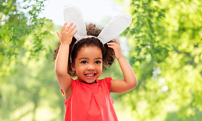 Image showing happy little girl wearing easter bunny ears