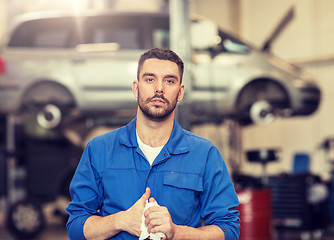 Image showing auto mechanic man or smith at car workshop