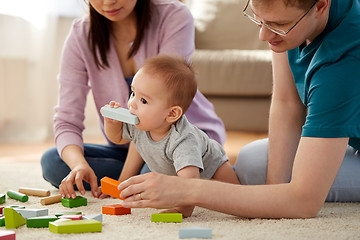 Image showing happy family with baby boy playing at home