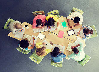 Image showing group of students with tablet pc at school library