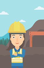 Image showing Miner with mining equipment on background.