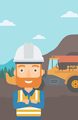 Image showing Miner with mining equipment on background.