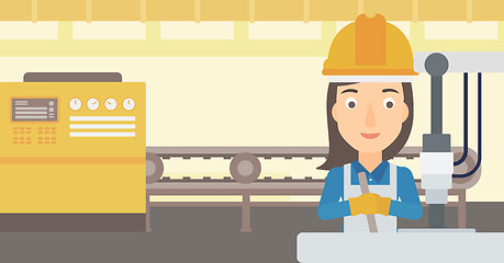 Image showing Woman working with industrial equipment.