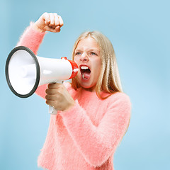 Image showing The little girl making announcement with megaphone