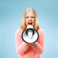 Image showing The little girl making announcement with megaphone