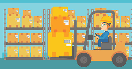 Image showing Warehouse worker moving load by forklift truck.