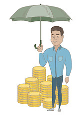 Image showing Hispanic business insurance agent with umbrella.