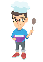 Image showing Caucasian boy holding a saucepan and a spoon.