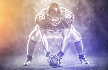 Image showing American football player starting football game