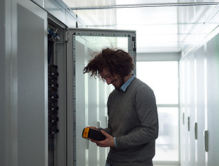 Image showing technician using digital cable analyzer