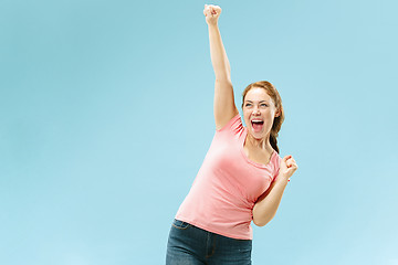 Image showing Winning success woman happy ecstatic celebrating being a winner. Dynamic energetic image of female model