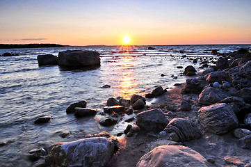 Image showing Sunset over water