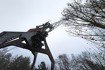 Image showing Rusty old industrial dock cranes at the Dock