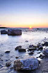 Image showing Sunset over water