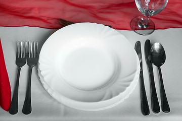 Image showing Plates and dishes on dining table