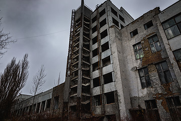 Image showing Large factory exterior in the fog