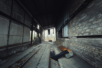 Image showing Abandoned industrial hallway angle shot