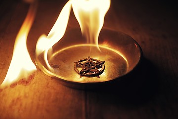 Image showing Old pentagram burning in flames