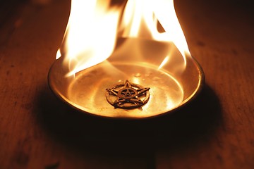 Image showing Old pentagram burning in flames