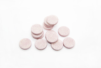 Image showing Heap of pink water soluble vitamins on white