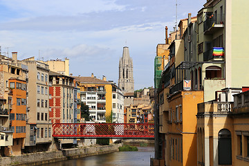 Image showing Colorful houses and Eiffel bridge and river Onyar in Girona