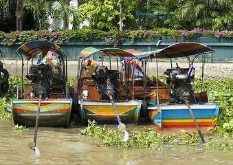 Image showing Three longtail riverboats in Bangkok