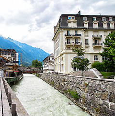 Image showing Arve river, buildings of Chamonix and Mont Blanc Massif