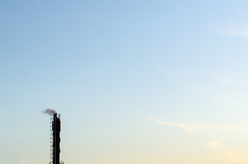 Image showing Industrial chimney with smoke