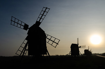 Image showing Old traditional windmills silhouettes