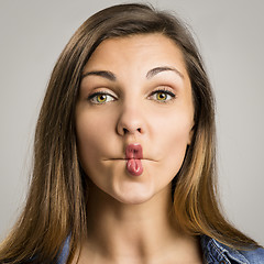 Image showing Woman making pout