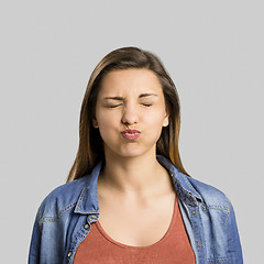 Image showing Woman making pout