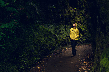 Image showing Female traveler making a trek 