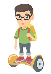 Image showing Caucasian schoolboy riding on gyroboard to school.