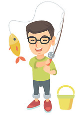 Image showing Little boy holding fishing rod with fish on hook.